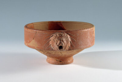 Mortar with lion's head weir